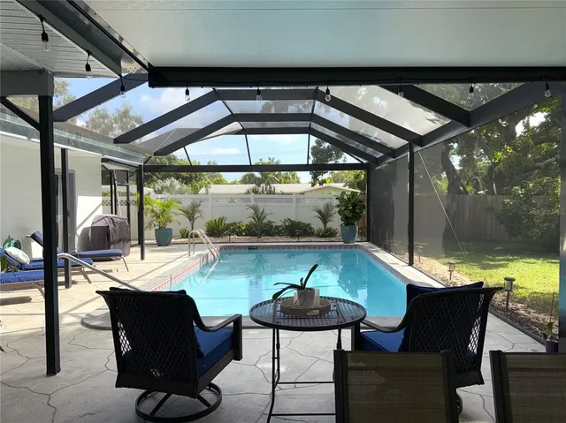 a view of a big room with an ocean view