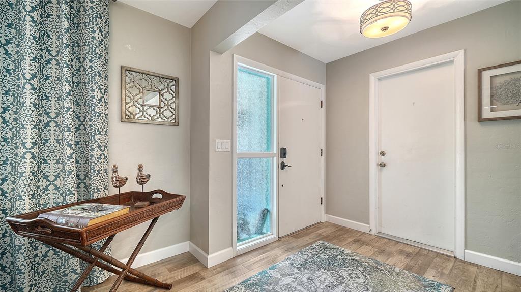 6758 South Lockwood Ridge Road Sarasota, FL 34231 - Photo 5 of 85 a room with storage and utility