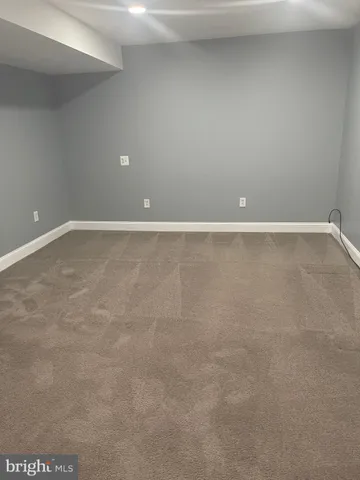 a view of a room with an empty space