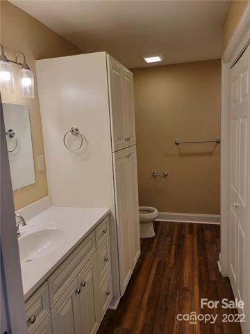 2231 Assention Road, Unit 12/1 Lancaster, SC 29720 - Photo 5 of 9 a bathroom with a sink a toilet a shower and a mirror
