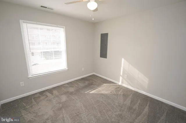 an empty room with a window