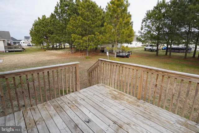 a balcony view with two benches