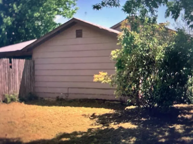 a view of a outdoor space and tree