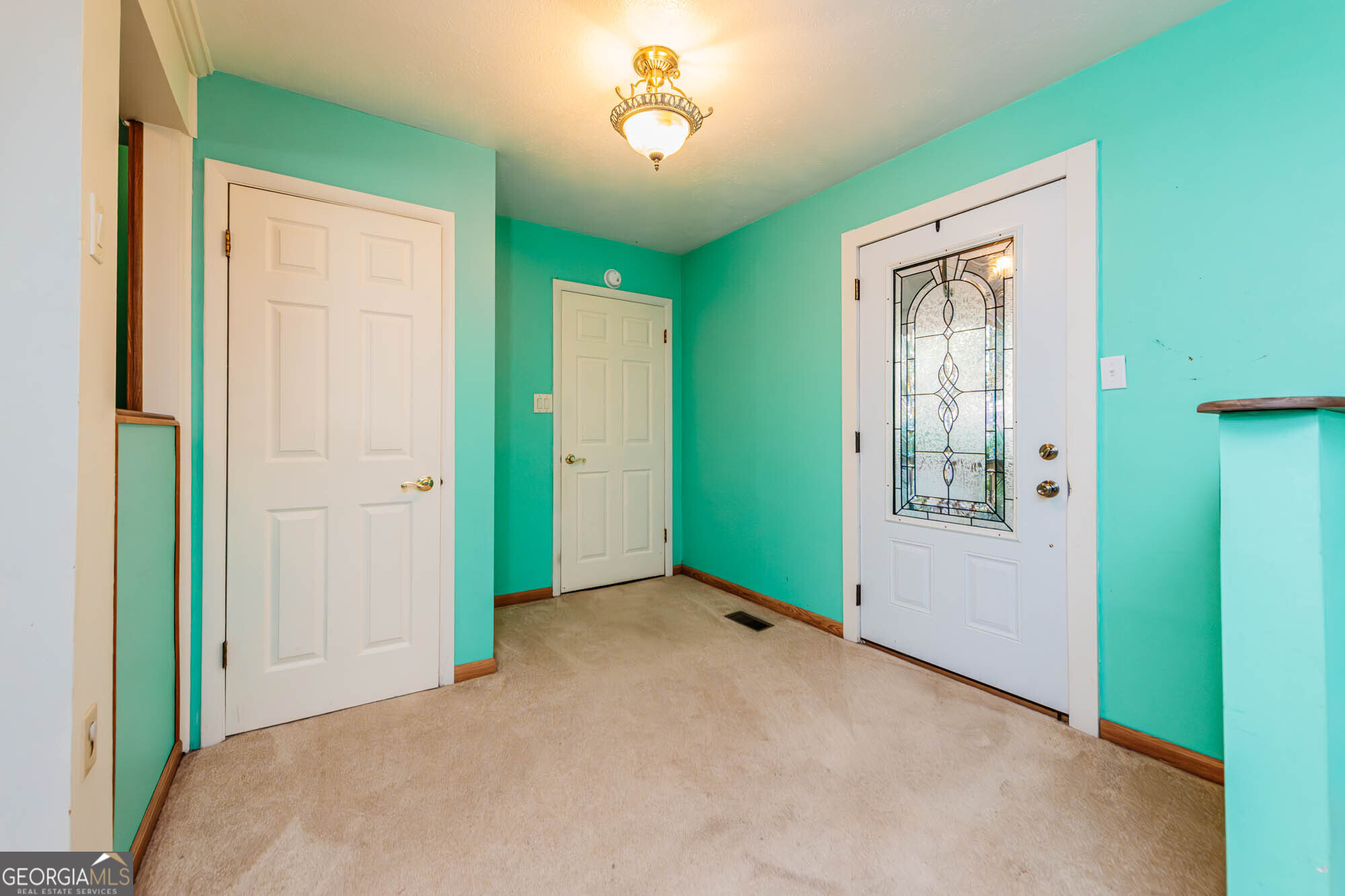 202 Brantley Road Warner Robins, GA 31093 - Photo 17 of 52 an empty room with windows and closet