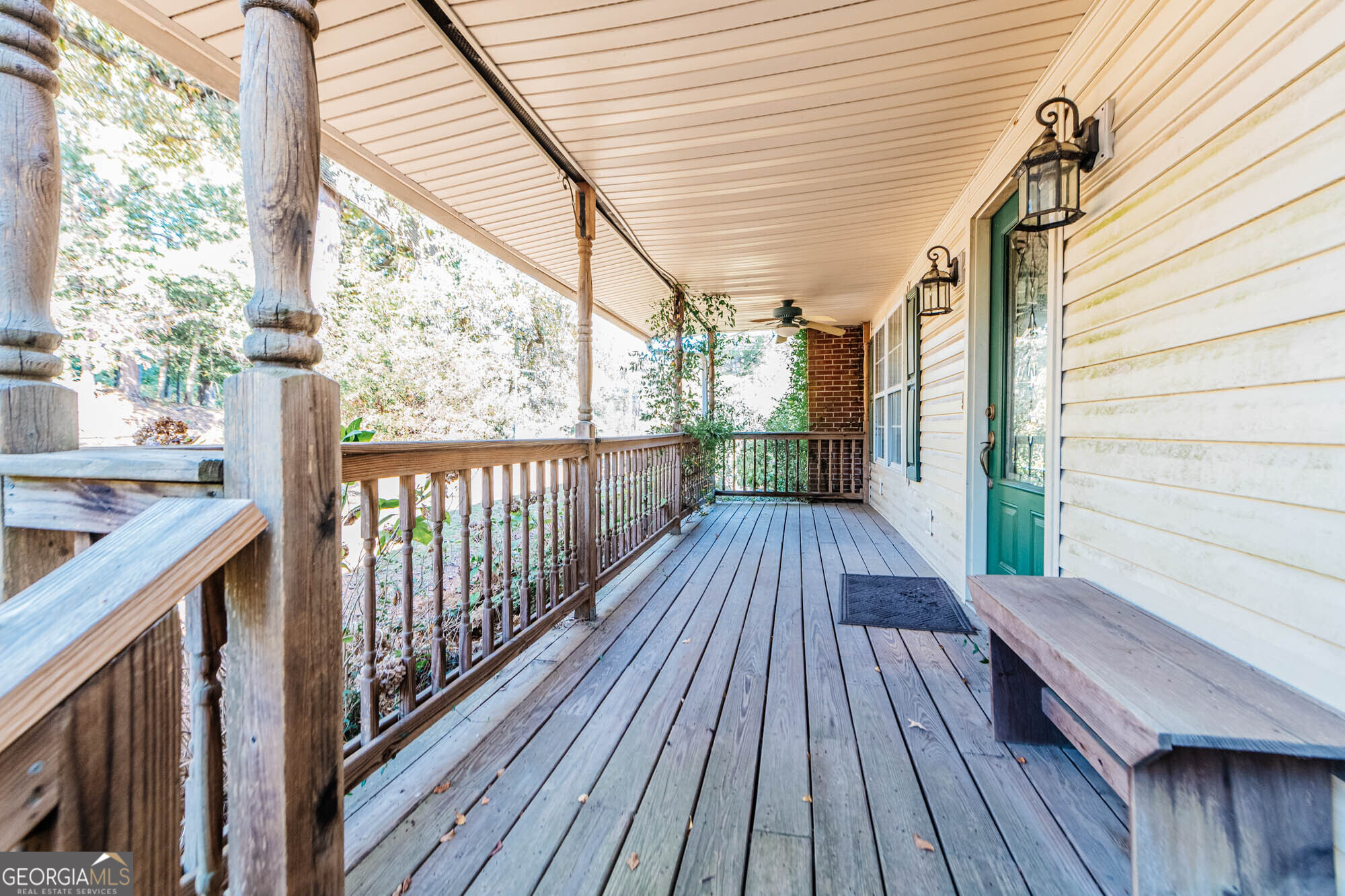 202 Brantley Road Warner Robins, GA 31093 - Photo 3 of 52 a view of deck with wooden floor and iron stairs
