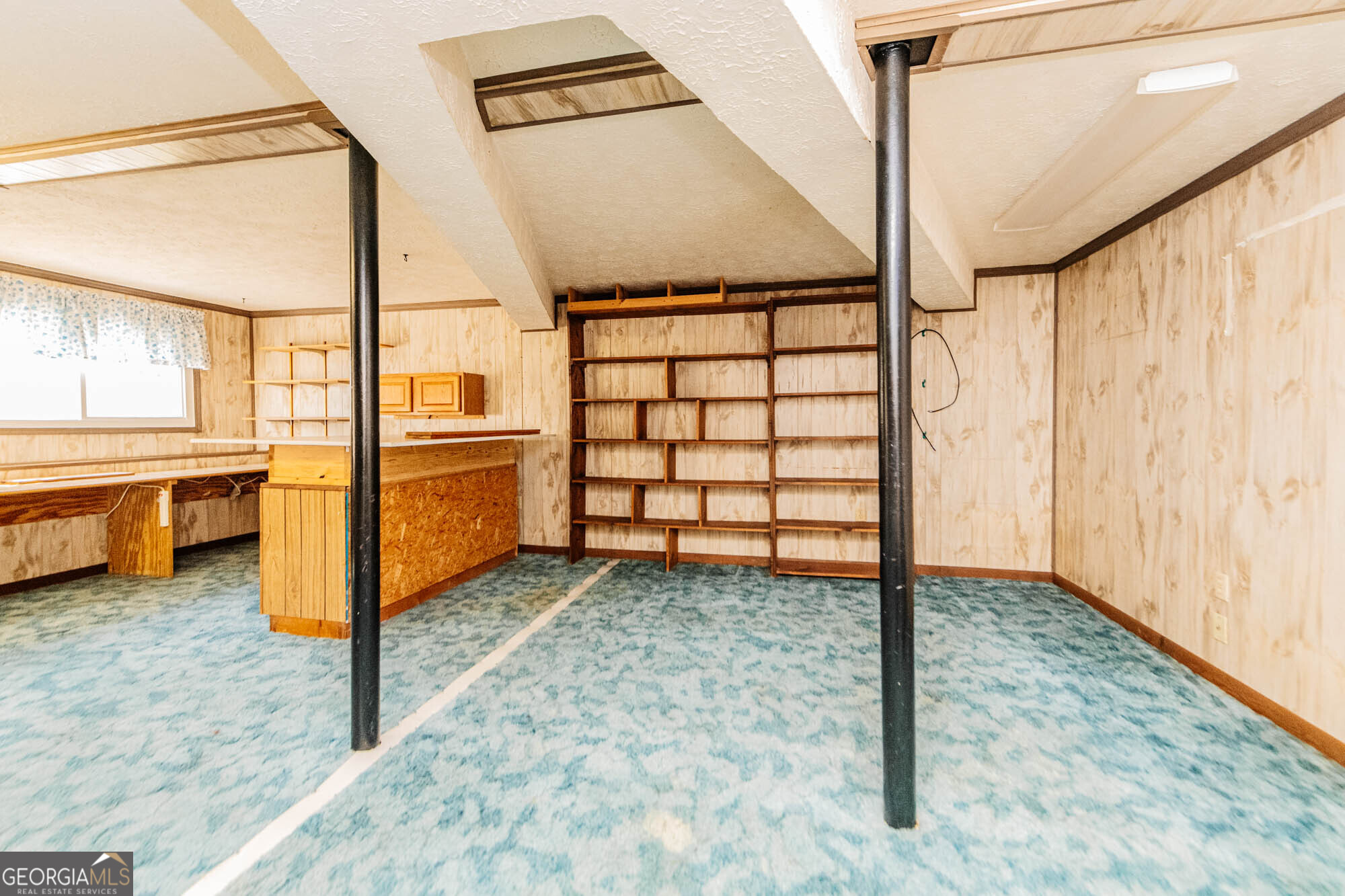 202 Brantley Road Warner Robins, GA 31093 - Photo 39 of 52 a view of an empty room with windows