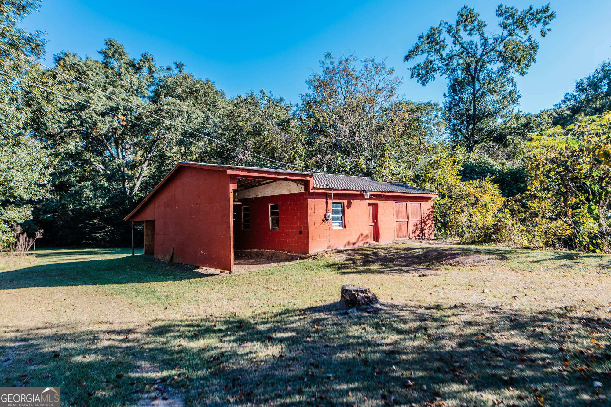 202 Brantley Road Warner Robins, GA 31093 - Photo 46 of 52 a view of a house with a yard