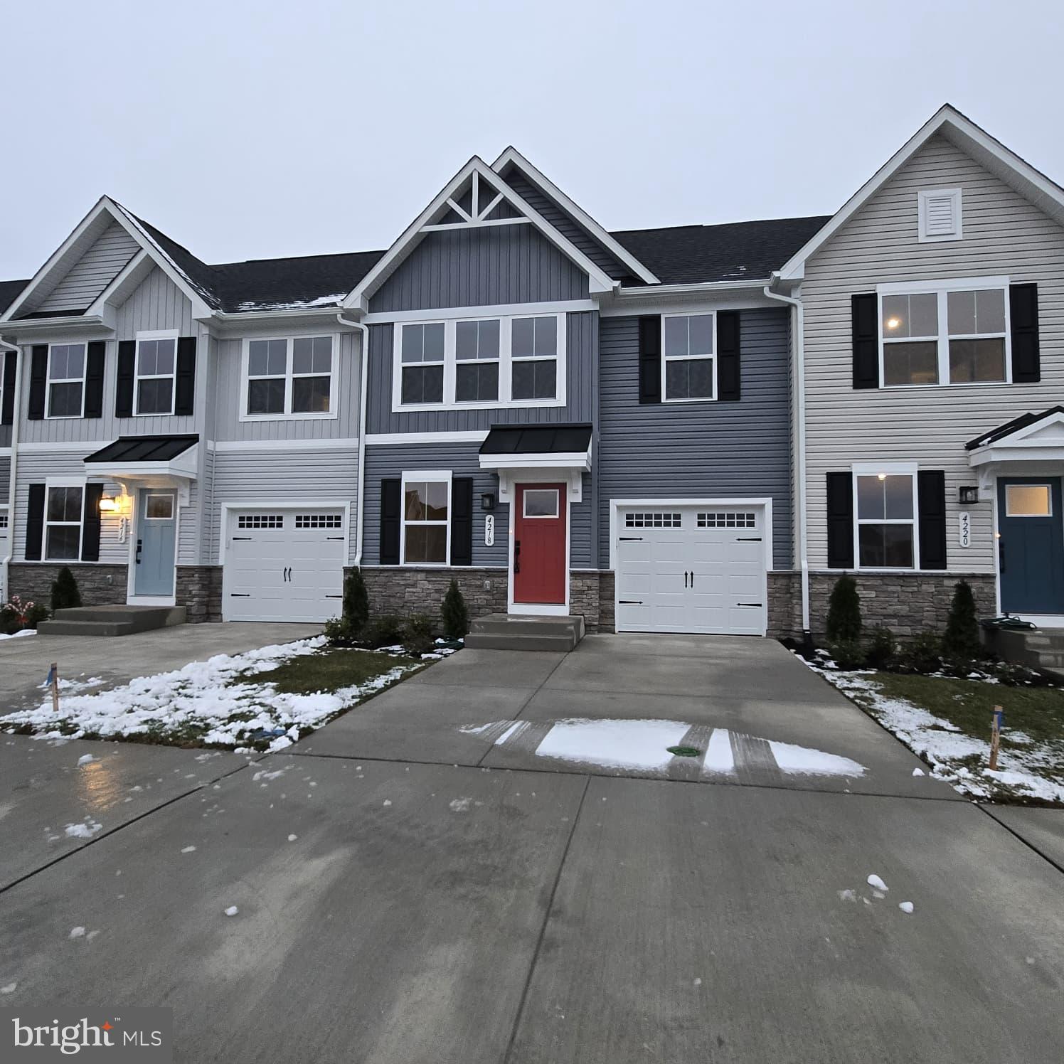 4218 Falkirk Place Fredericksburg, VA 22408 - Photo 1 of 36 a front view of a house with a yard