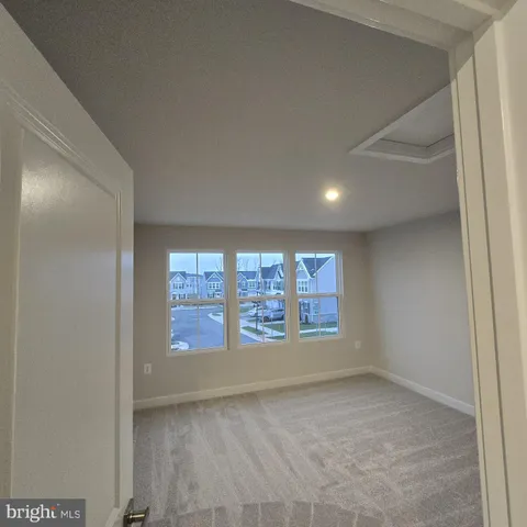 a close view of a sink and a refrigerator