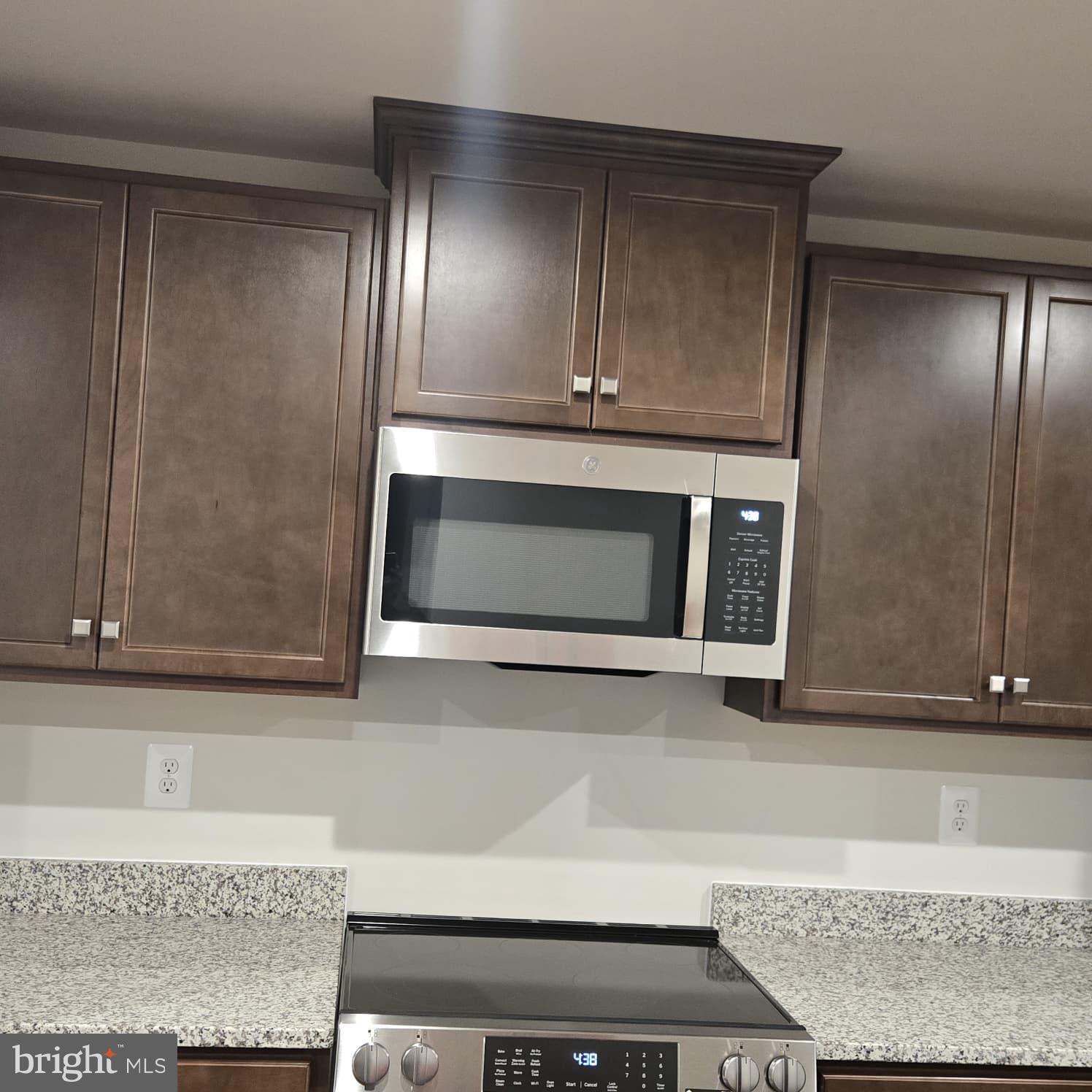 4218 Falkirk Place Fredericksburg, VA 22408 - Photo 20 of 36 a living room with a fireplace