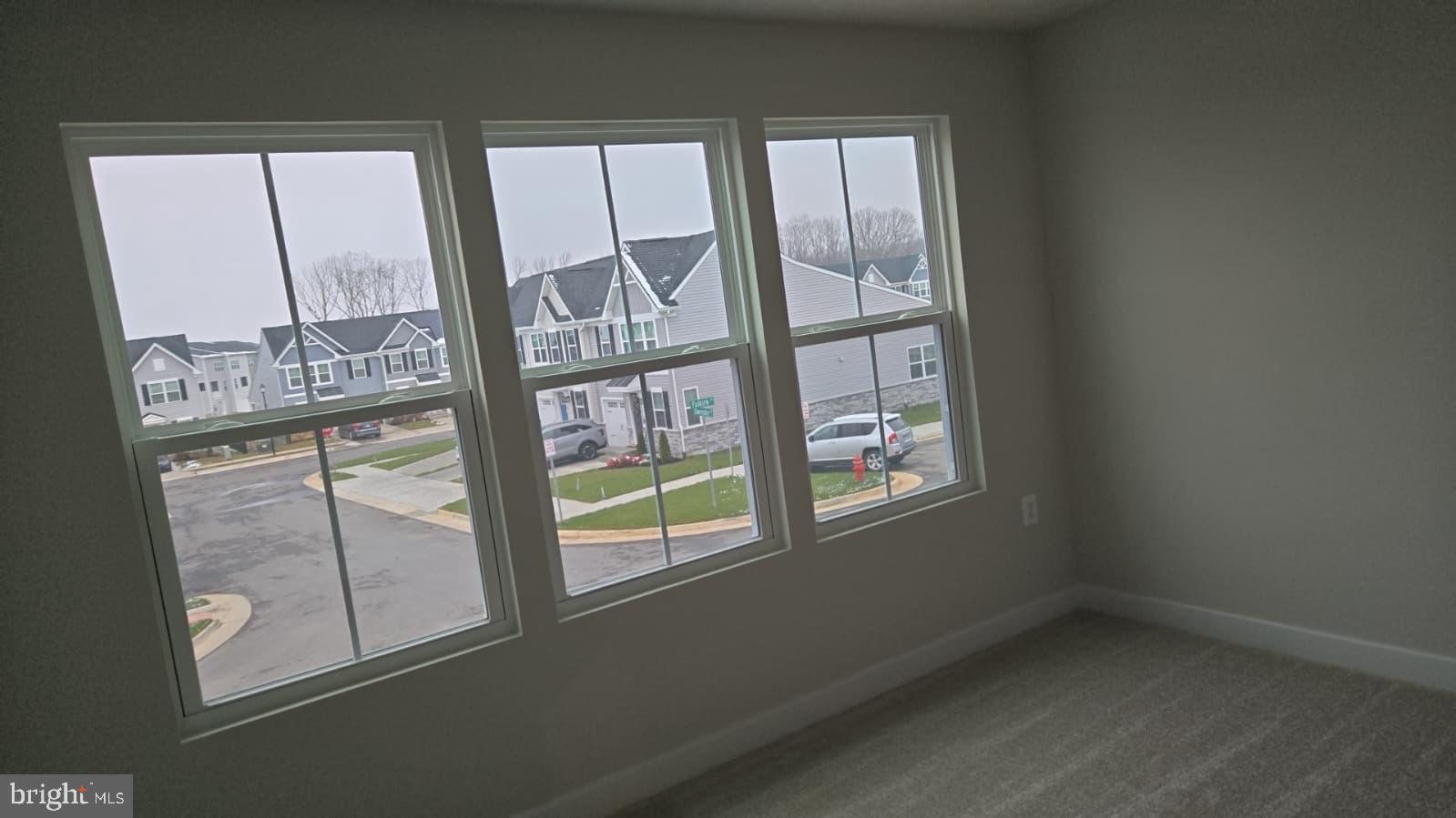 4218 Falkirk Place Fredericksburg, VA 22408 - Photo 26 of 36 an empty room with windows