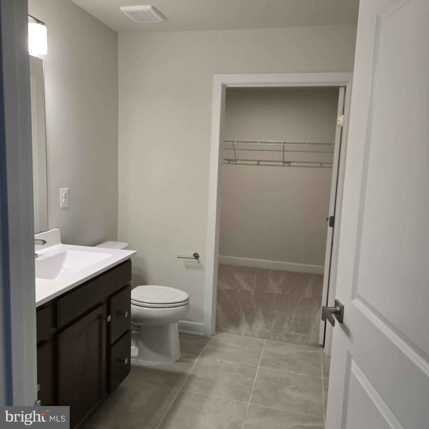 4218 Falkirk Place Fredericksburg, VA 22408 - Photo 33 of 36 a bathroom with a sink toilet and vanity