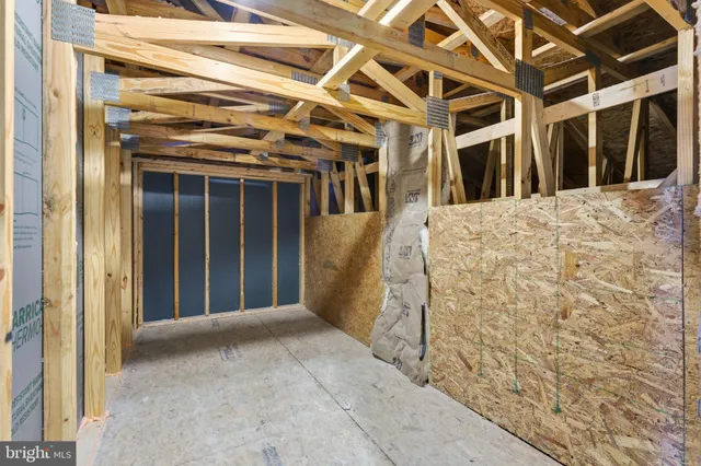 a street sign on a brick wall