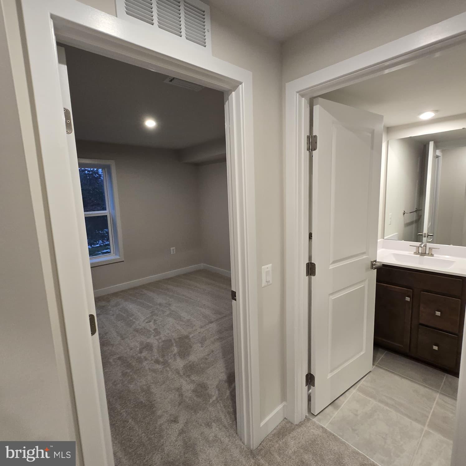 4218 Falkirk Place Fredericksburg, VA 22408 - Photo 6 of 36 a bathroom with a sink and a mirror