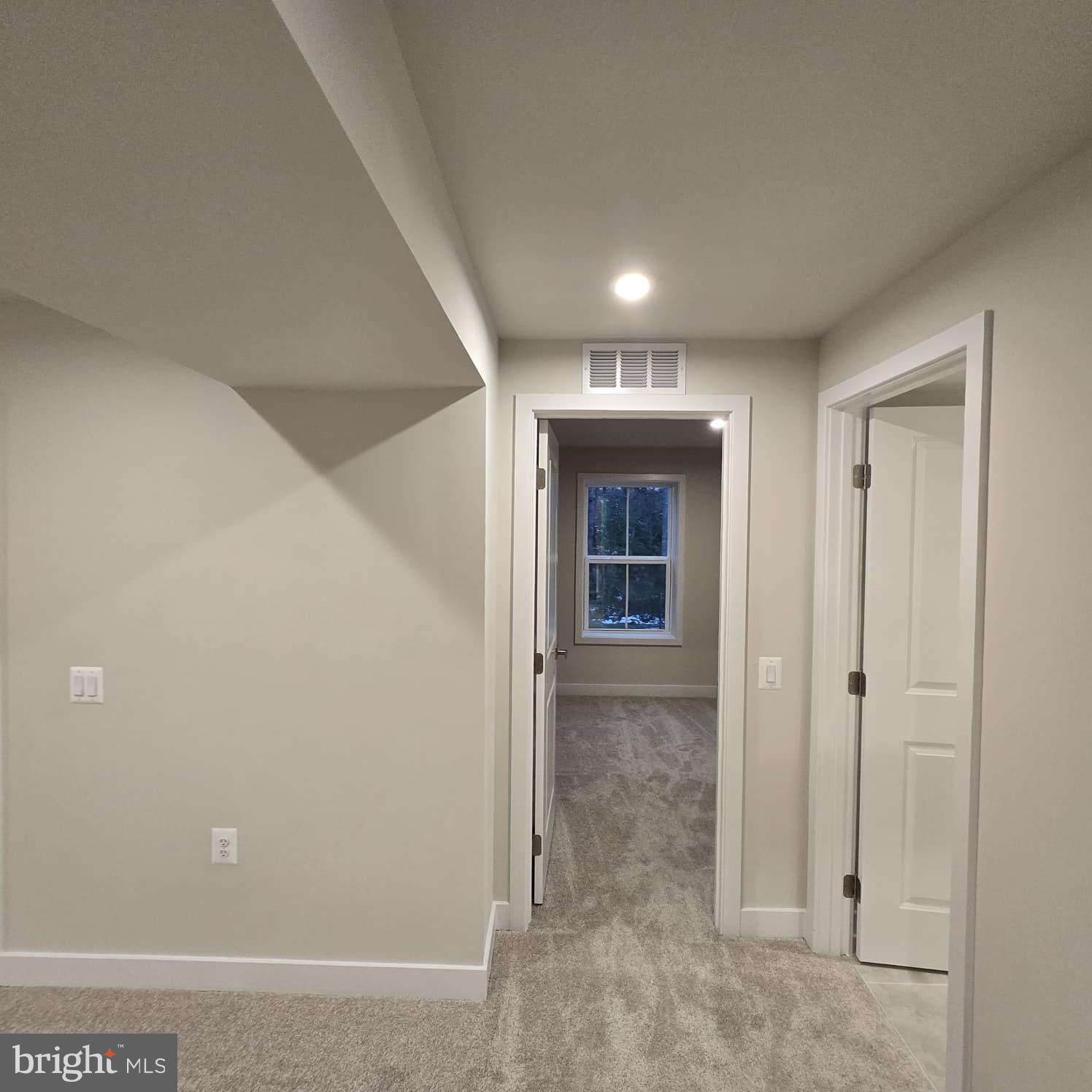 4218 Falkirk Place Fredericksburg, VA 22408 - Photo 7 of 36 an empty room with windows