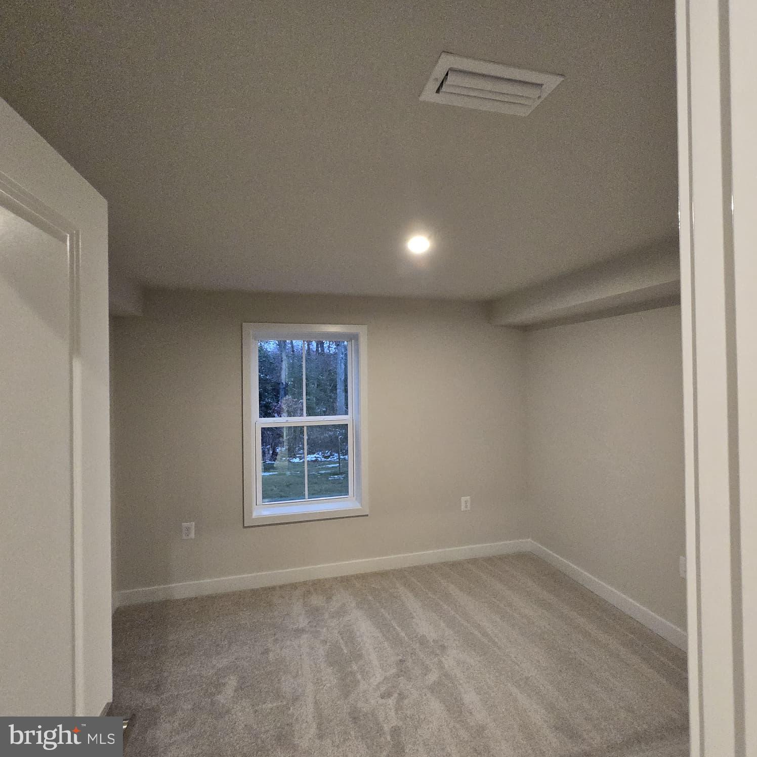 4218 Falkirk Place Fredericksburg, VA 22408 - Photo 8 of 36 an empty room with a window