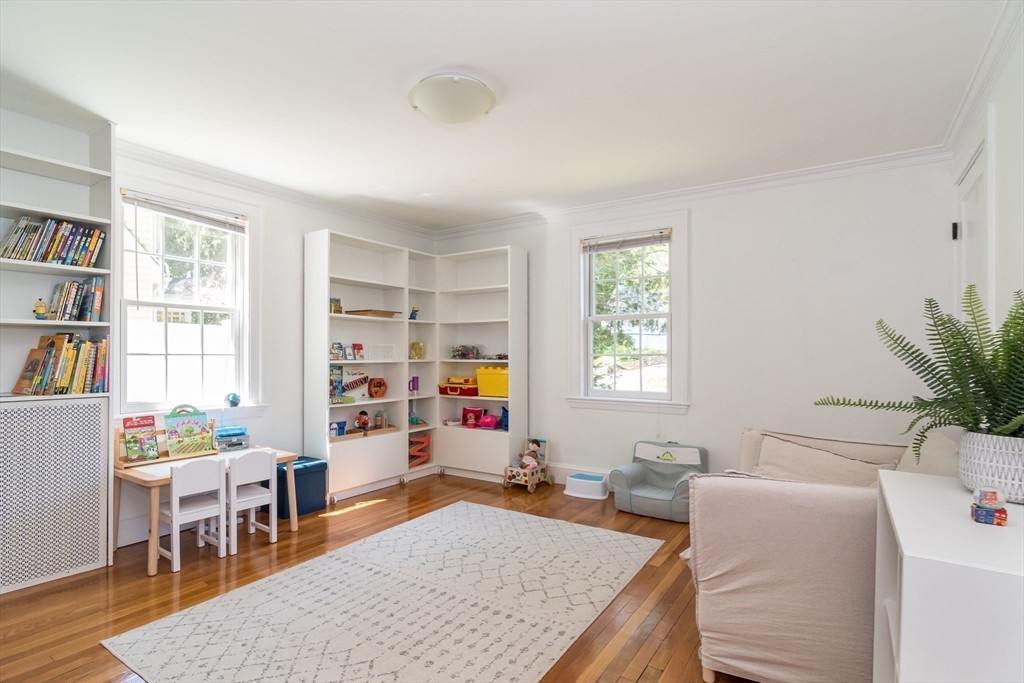 28 Cunningham Road Wellesley, MA 02481 - Photo 8 of 18 a living room with furniture and a table