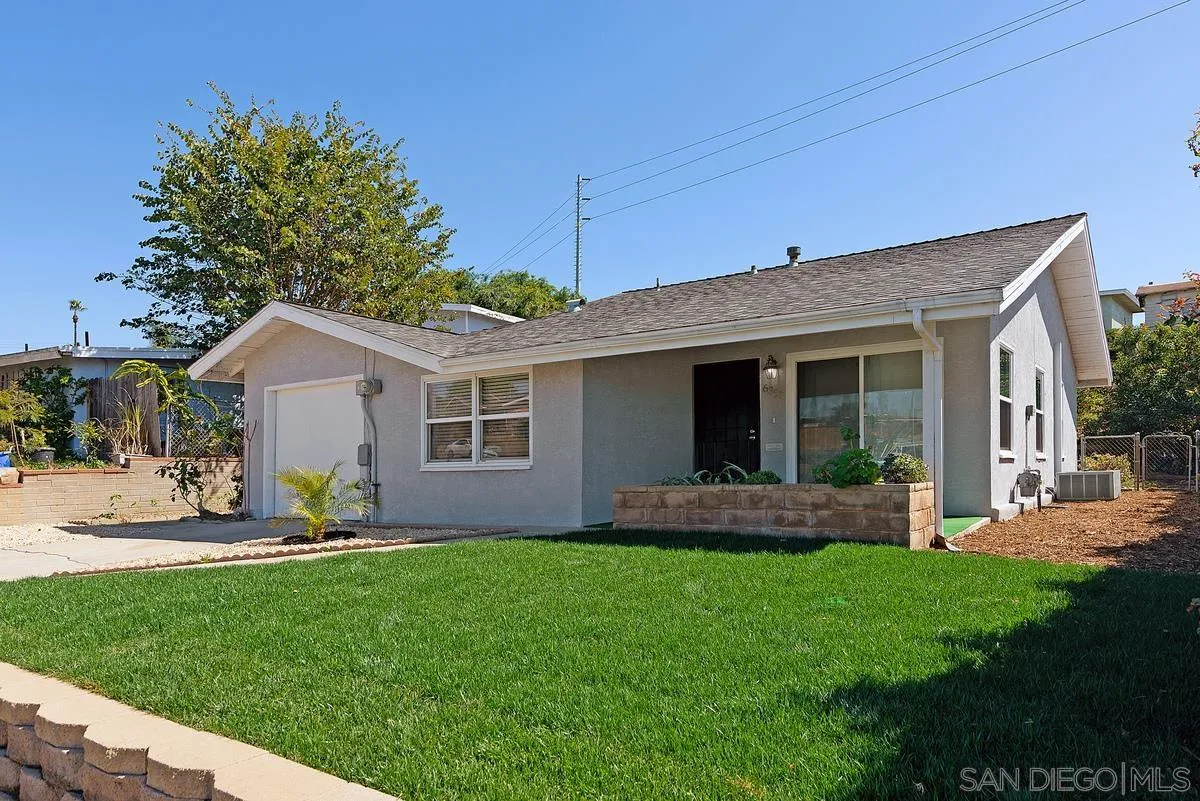 6357 Streamview Drive San Diego, CA 92115 - Photo 2 of 13 a front view of house with a garden and yard