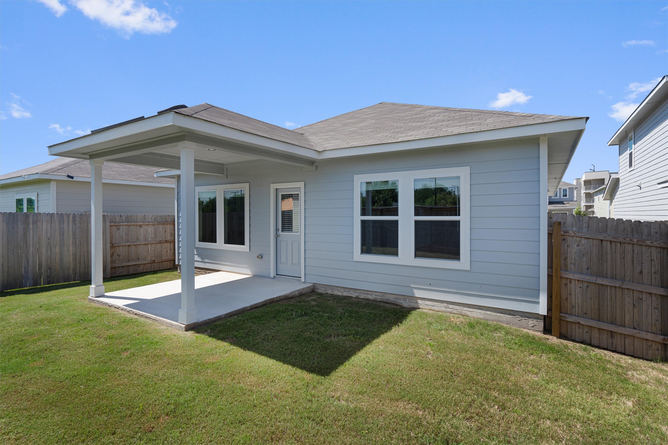 2606 Totley Road Manor, TX 78653 - Photo 22 of 28 a view of outdoor space yard and front view of a house