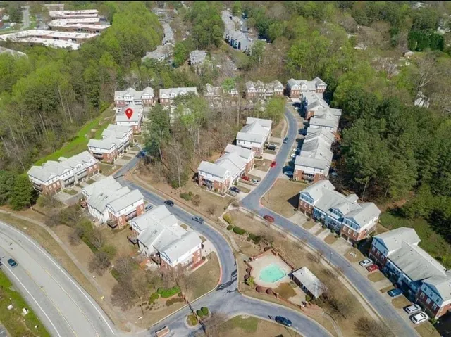 an aerial view of a city with lots of residential buildings