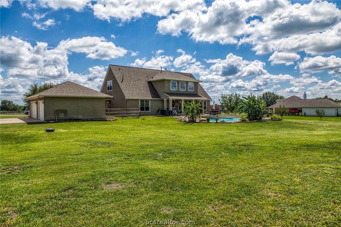 586 Ruby Drive Bellville, TX 77418 - Photo 40 of 50 a view of a house with a big yard