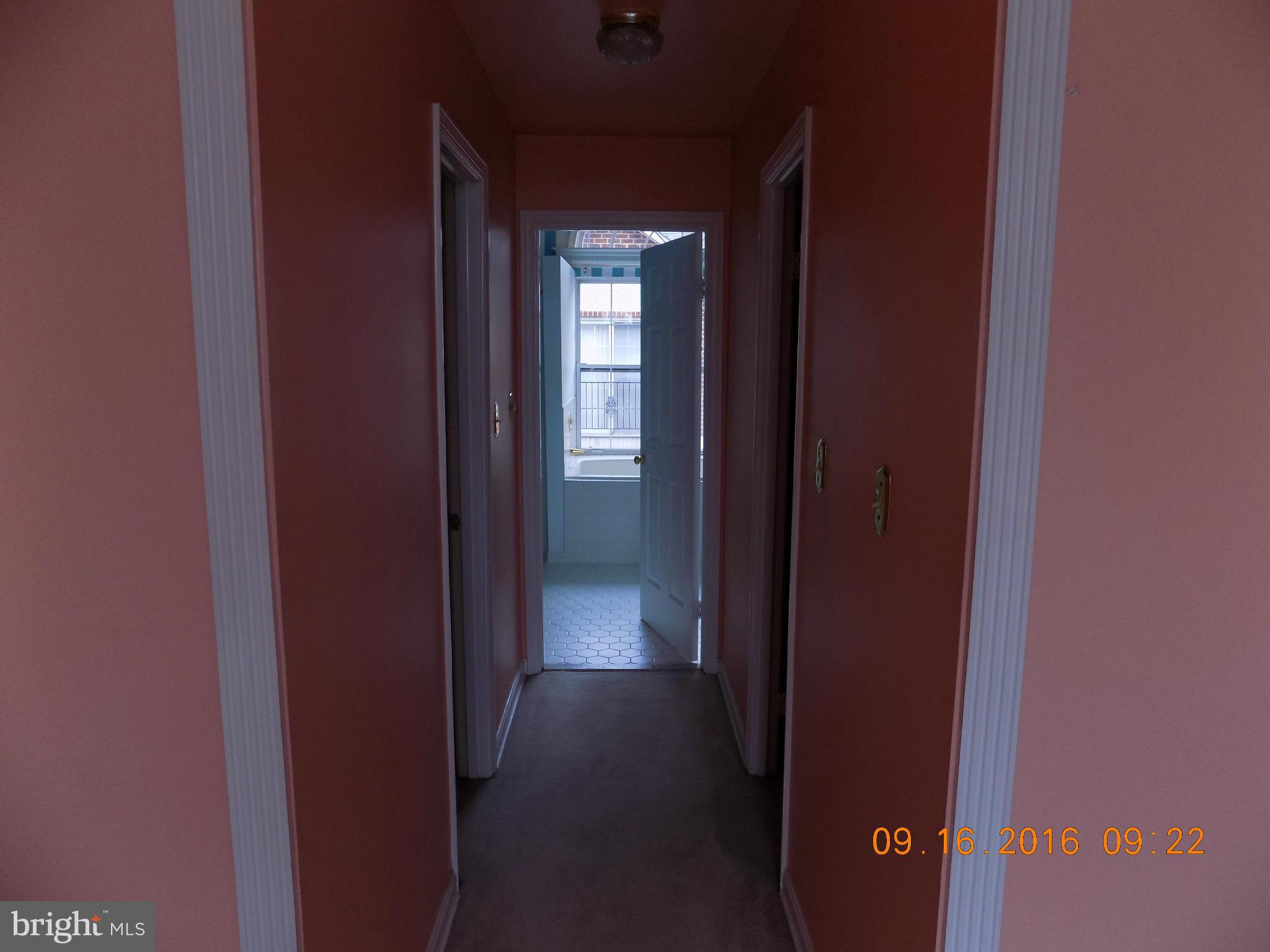 3038 South Glebe Road Arlington, VA 22206 - Photo 17 of 26 a view of a hallway with wooden floor