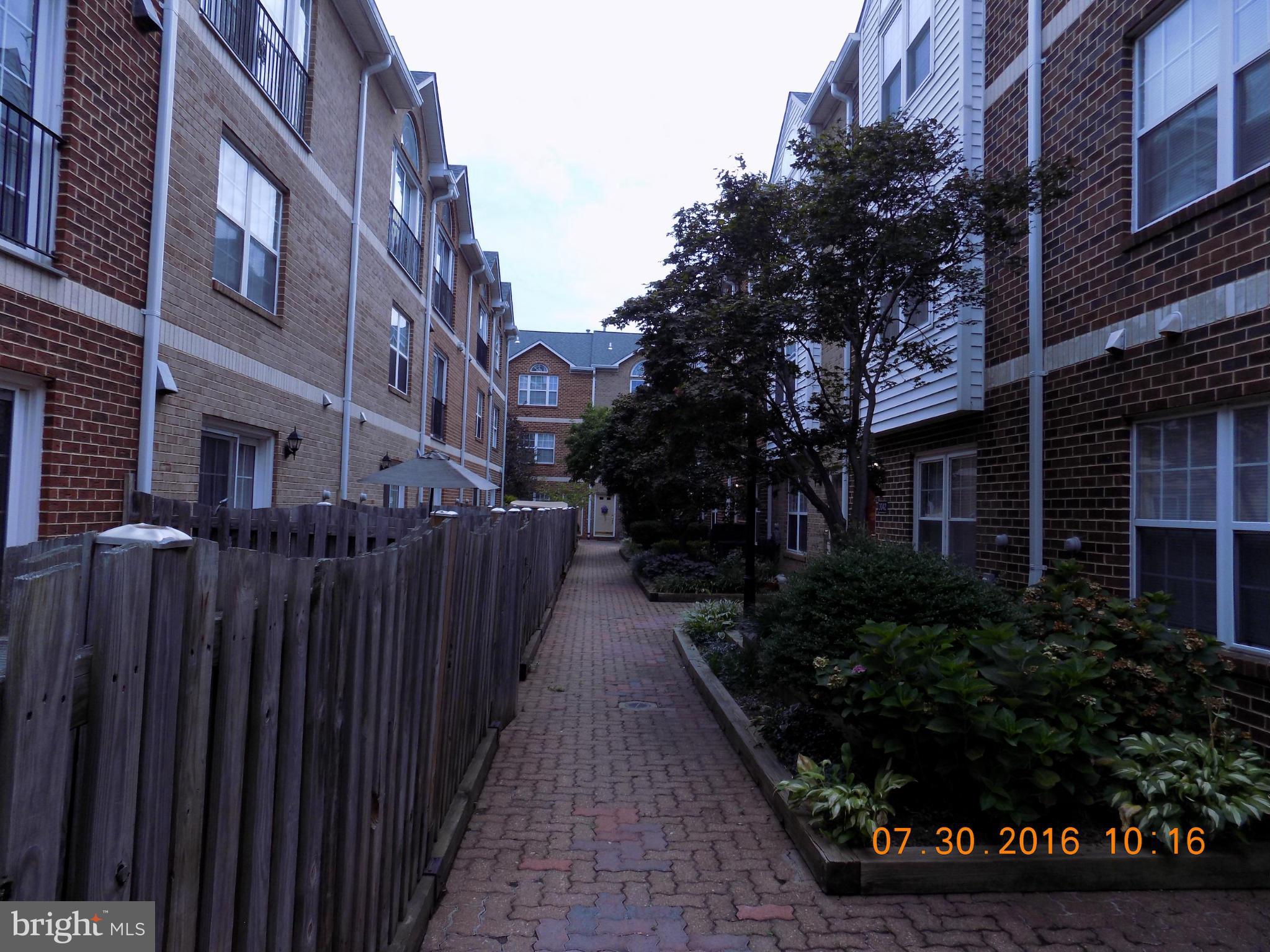 3038 South Glebe Road Arlington, VA 22206 - Photo 22 of 26 a view of a pathway with a house