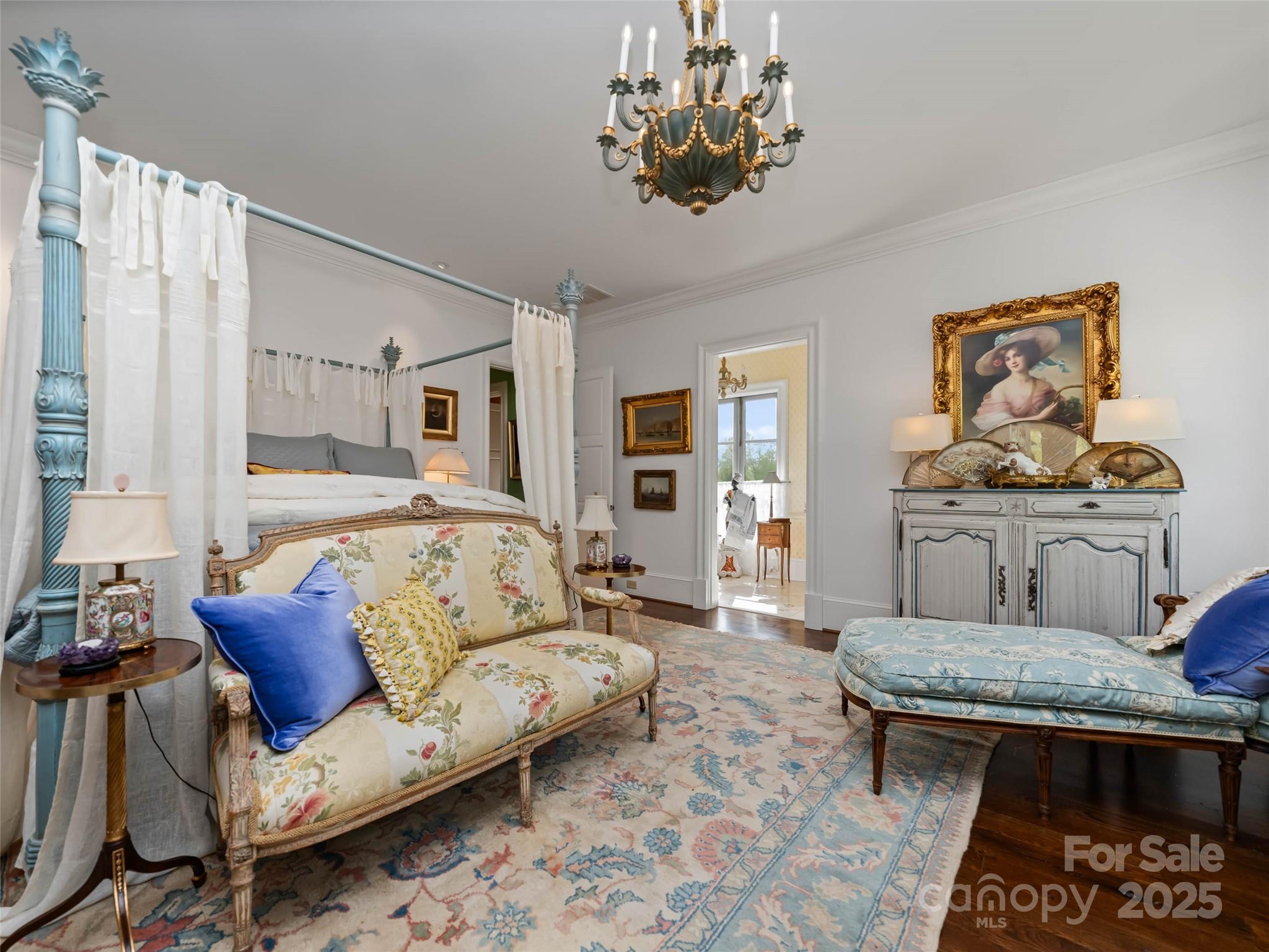 13084 Canada Road Tuckasegee, NC 28783 - Photo 14 of 48 a living room with furniture and a chandelier