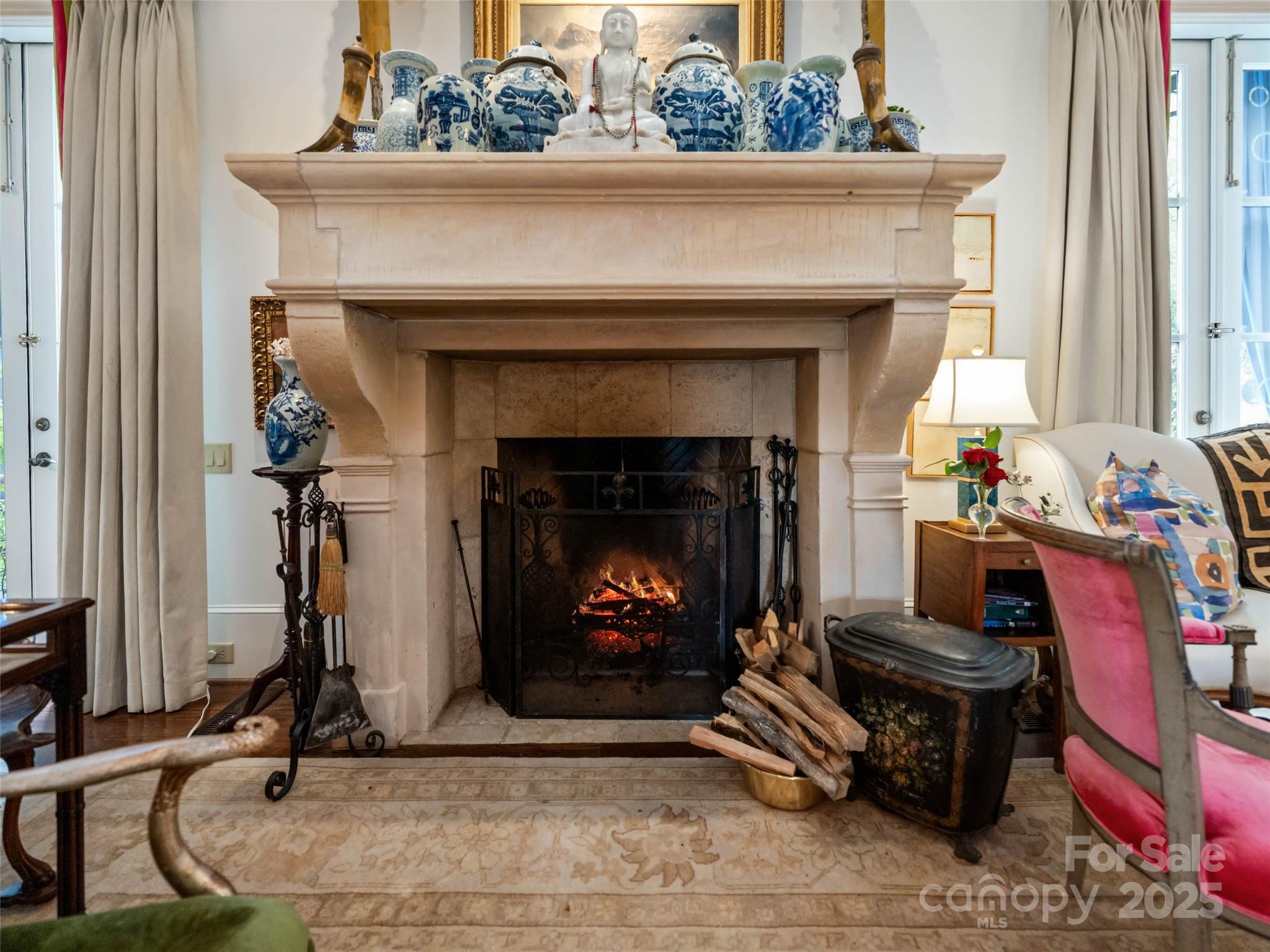 13084 Canada Road Tuckasegee, NC 28783 - Photo 23 of 48 a living room with furniture and a fireplace