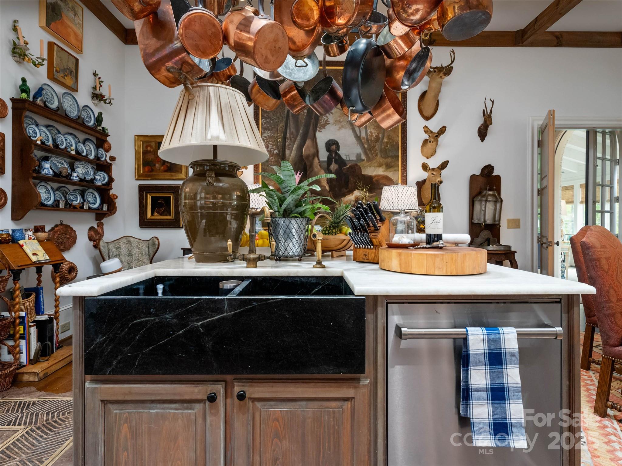 13084 Canada Road Tuckasegee, NC 28783 - Photo 26 of 48 a kitchen with a sink and cabinets