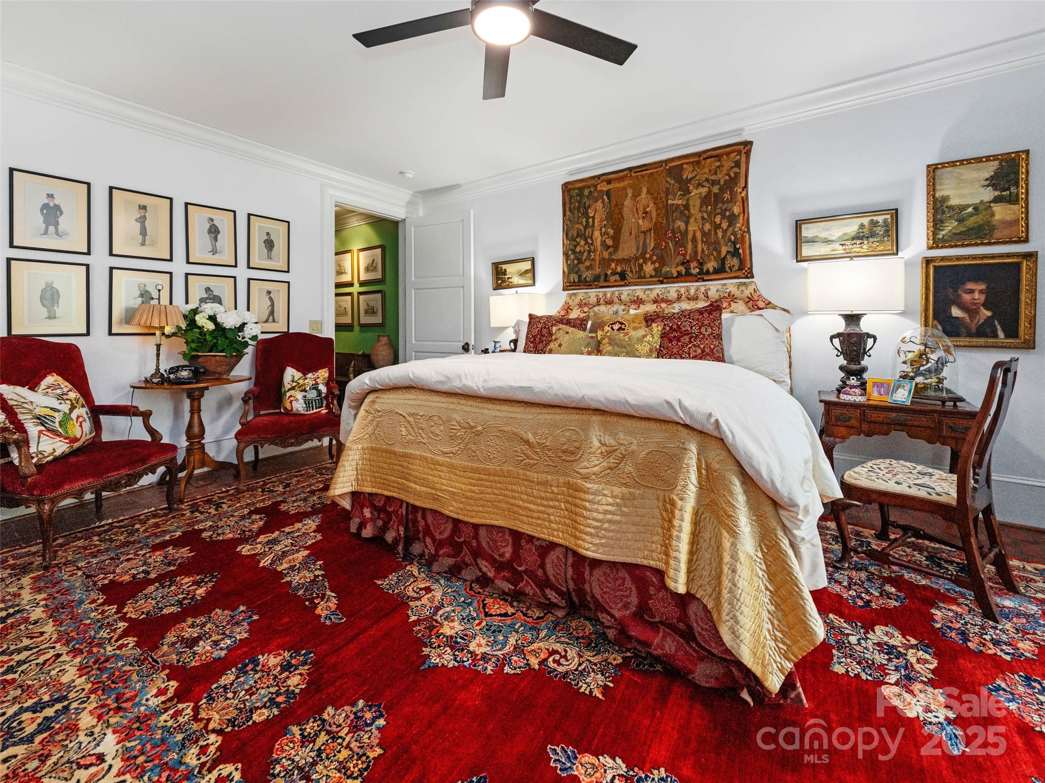 13084 Canada Road Tuckasegee, NC 28783 - Photo 29 of 48 a bed sitting in a bedroom next to a window with a bookshelf