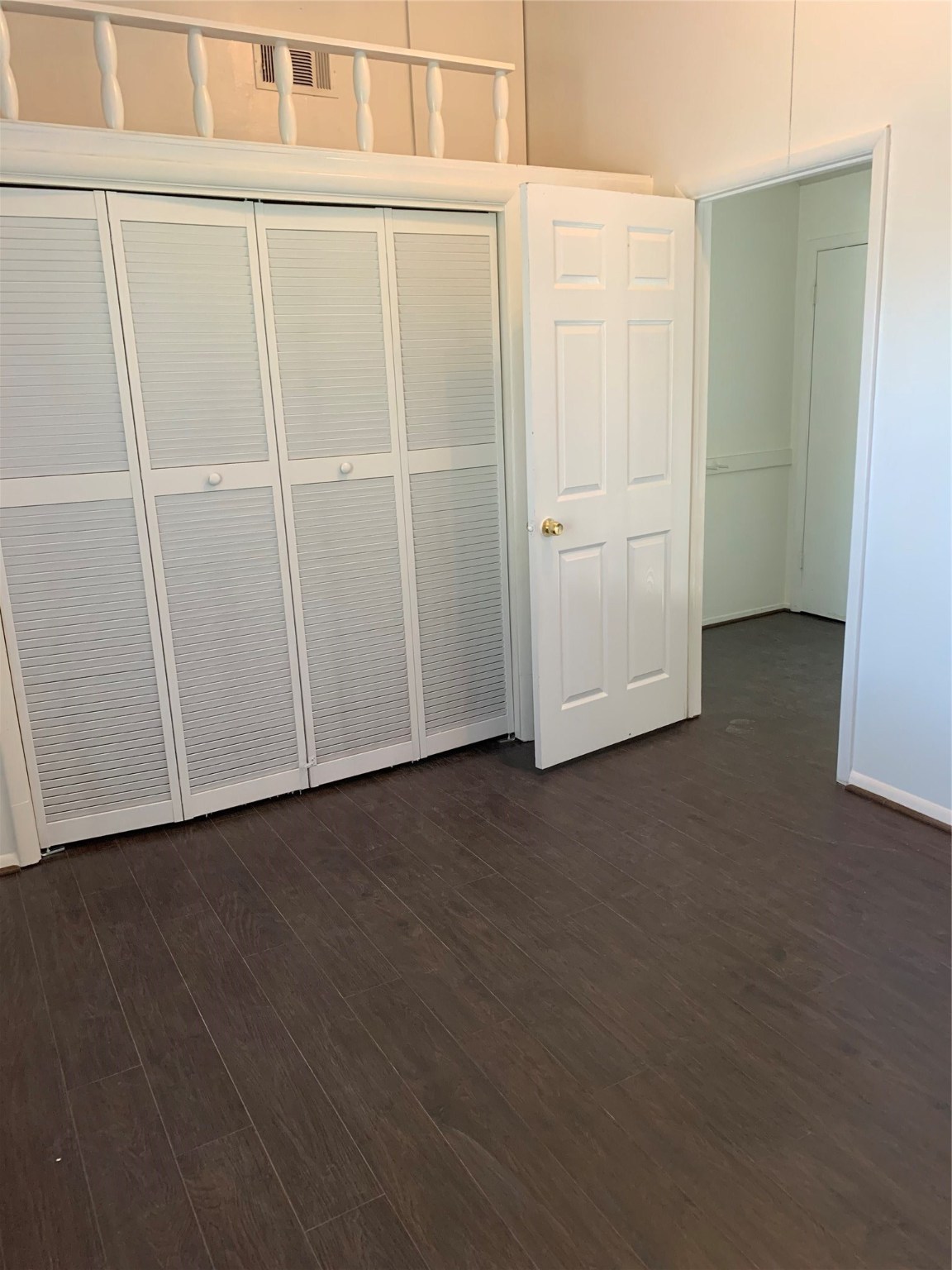 11110 Bammel North Houston Road, Unit C Houston, TX 77066 - Photo 4 of 13 Secondary bedroom 1 alternate view. Wood flooring throughout home!