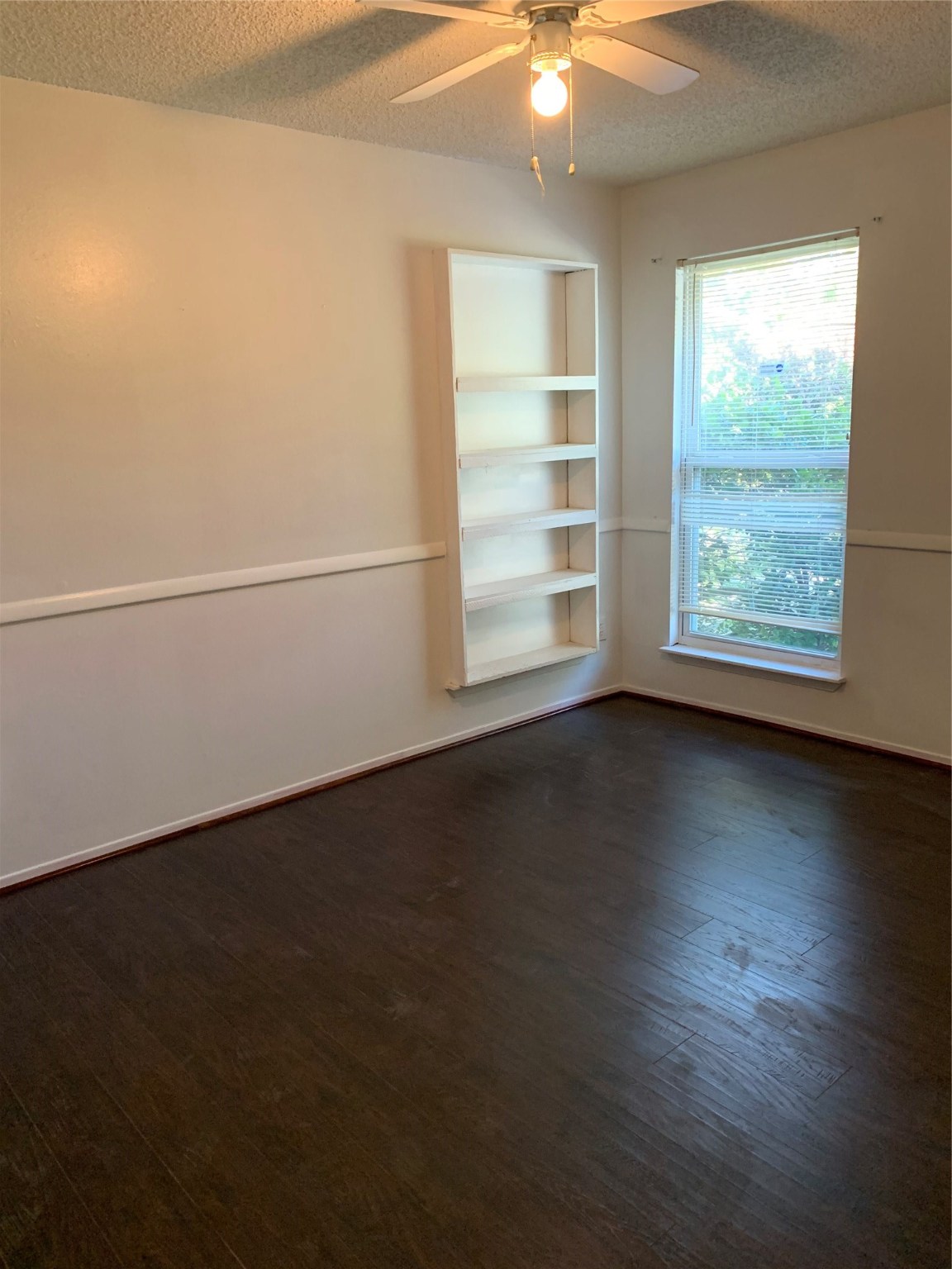 11110 Bammel North Houston Road, Unit C Houston, TX 77066 - Photo 9 of 13 Secondary bedroom #2 upstairs. Wood flooring throughout home!