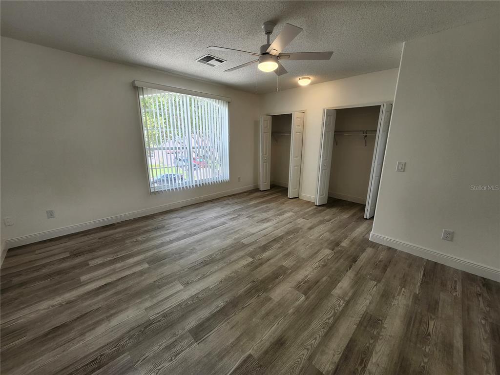 4694 Prairie Point Boulevard Kissimmee, FL 34746 - Photo 18 of 23 a view of an empty room with a window