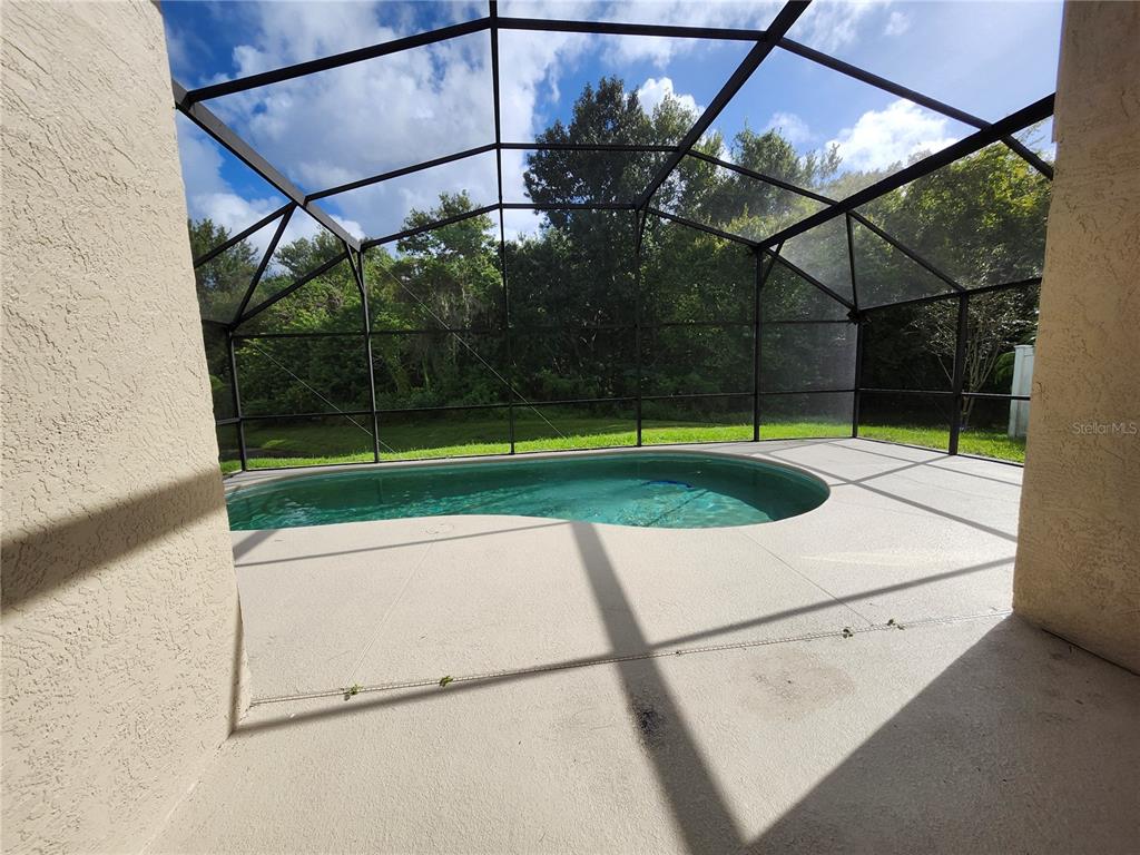 4694 Prairie Point Boulevard Kissimmee, FL 34746 - Photo 20 of 23 a white bath tub sitting in a bathroom and shower