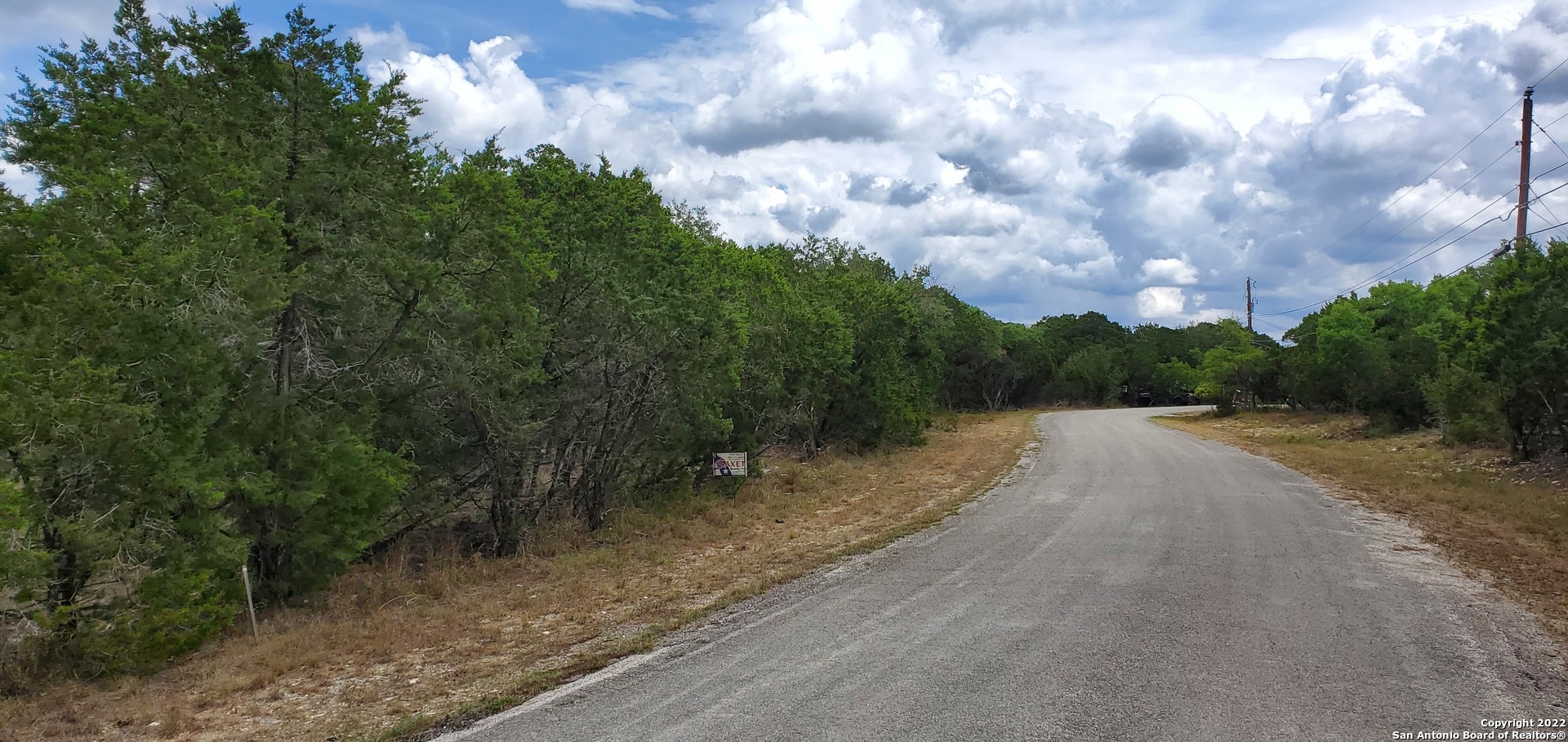 0 North Park Road Canyon Lake, TX 78133 - Photo 26 of 26 a view of a street with trees in the background