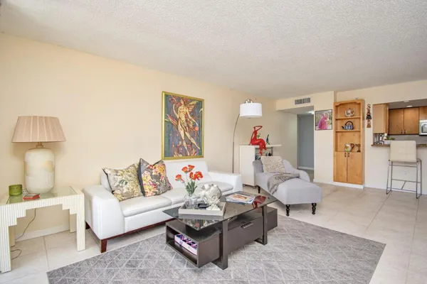 a living room with furniture and a couch