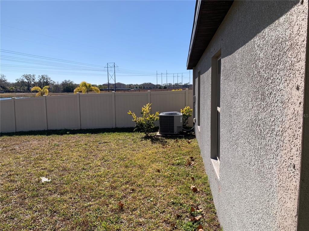 1522 Tiger Tooth Place Ruskin, FL 33570 - Photo 8 of 9 a view of a backyard