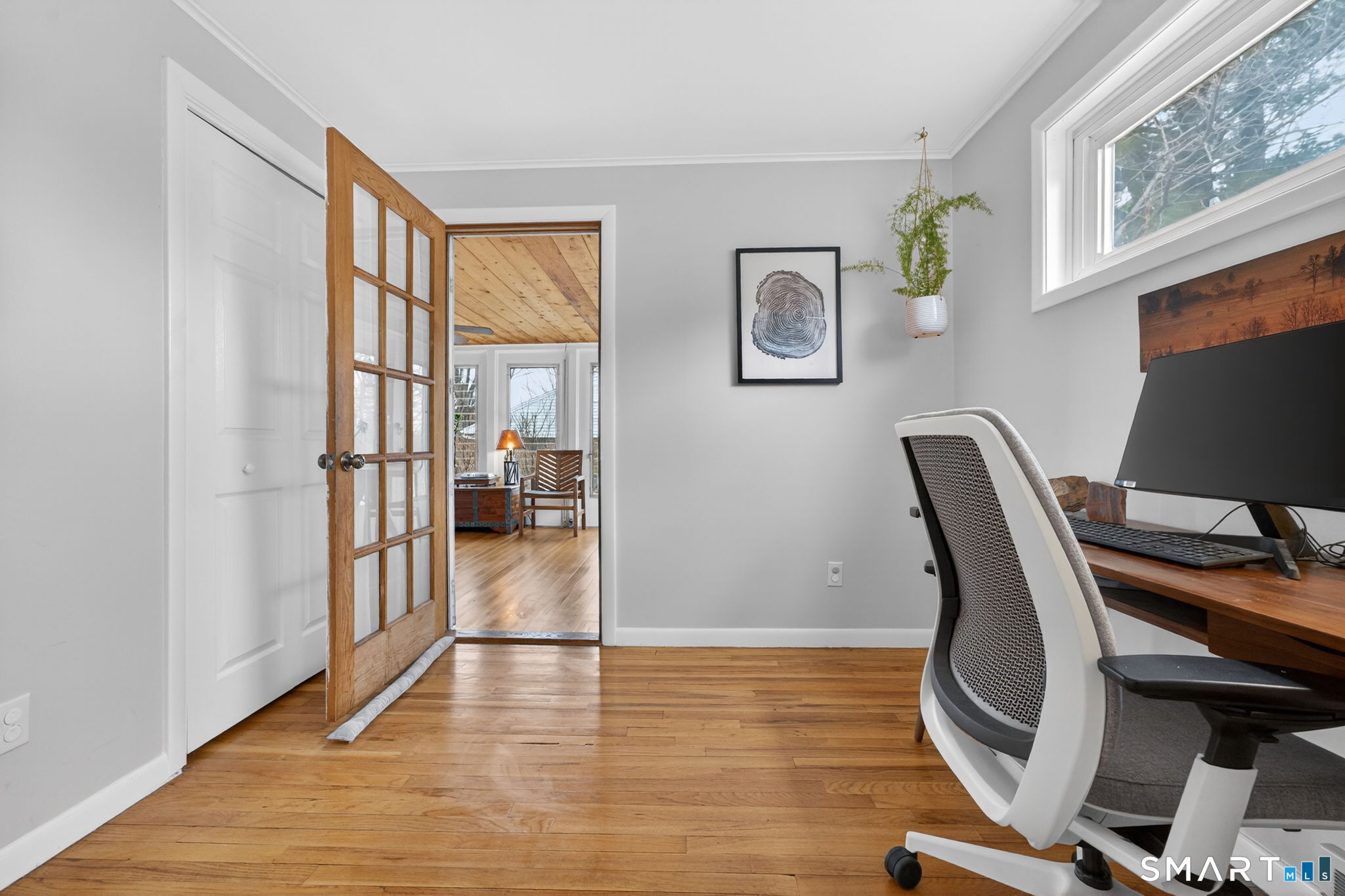 12 Lewis Street Simsbury, CT 06081 - Photo 16 of 35 a view of a workspace with furniture and a window