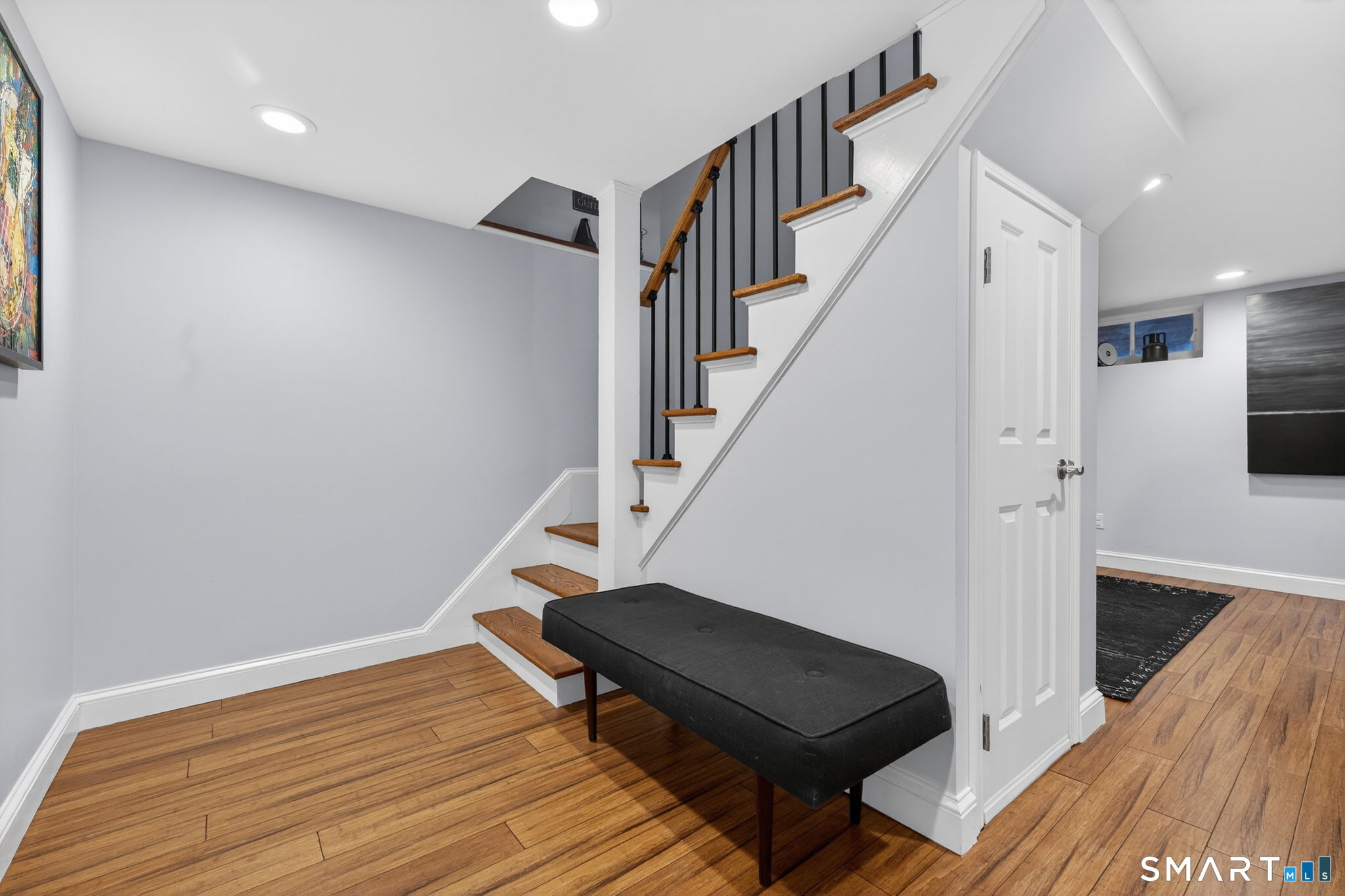 12 Lewis Street Simsbury, CT 06081 - Photo 23 of 35 a view of entryway and hall with wooden floor