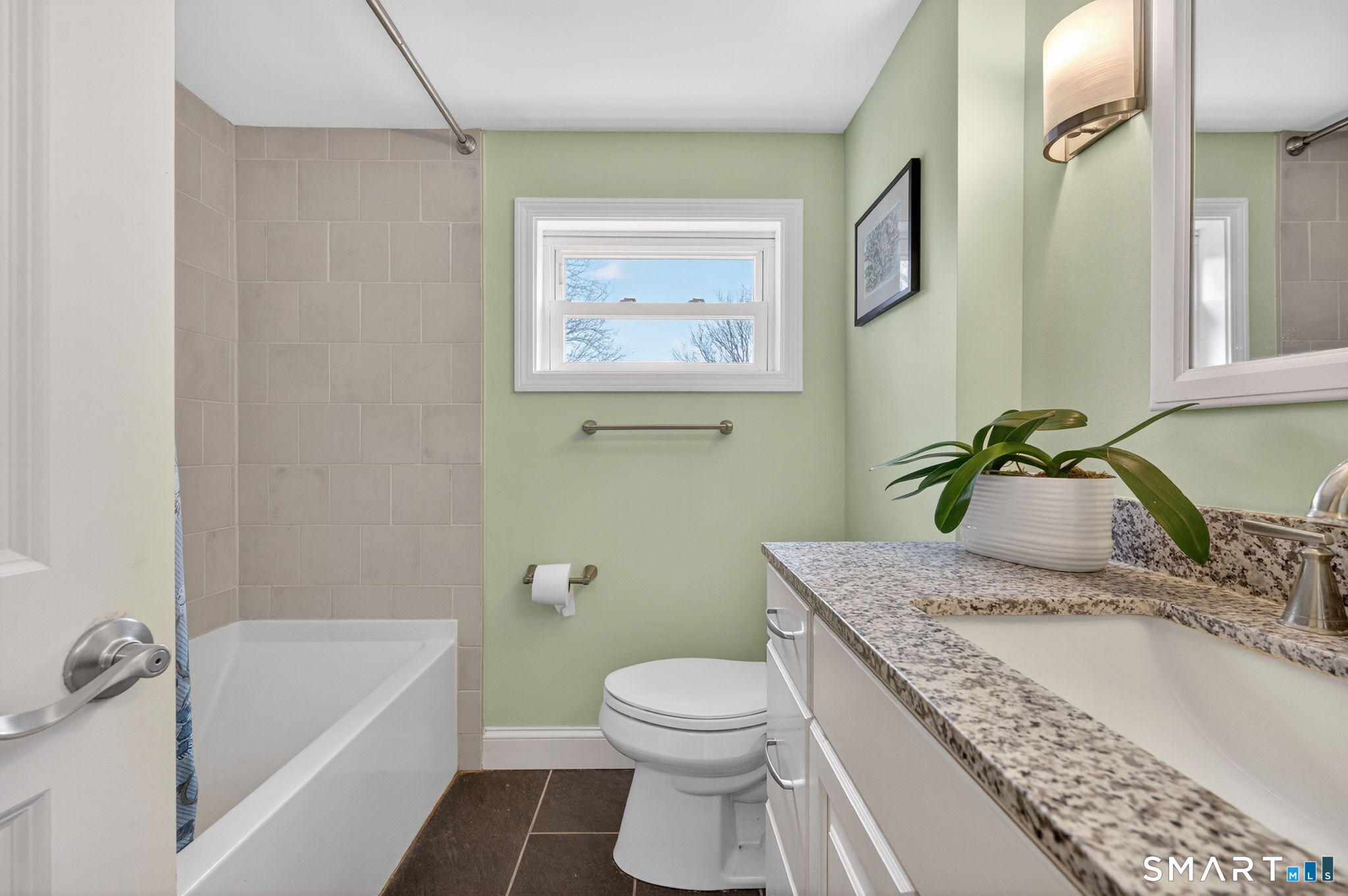 12 Lewis Street Simsbury, CT 06081 - Photo 28 of 35 a bathroom with a granite countertop sink a toilet and bathtub