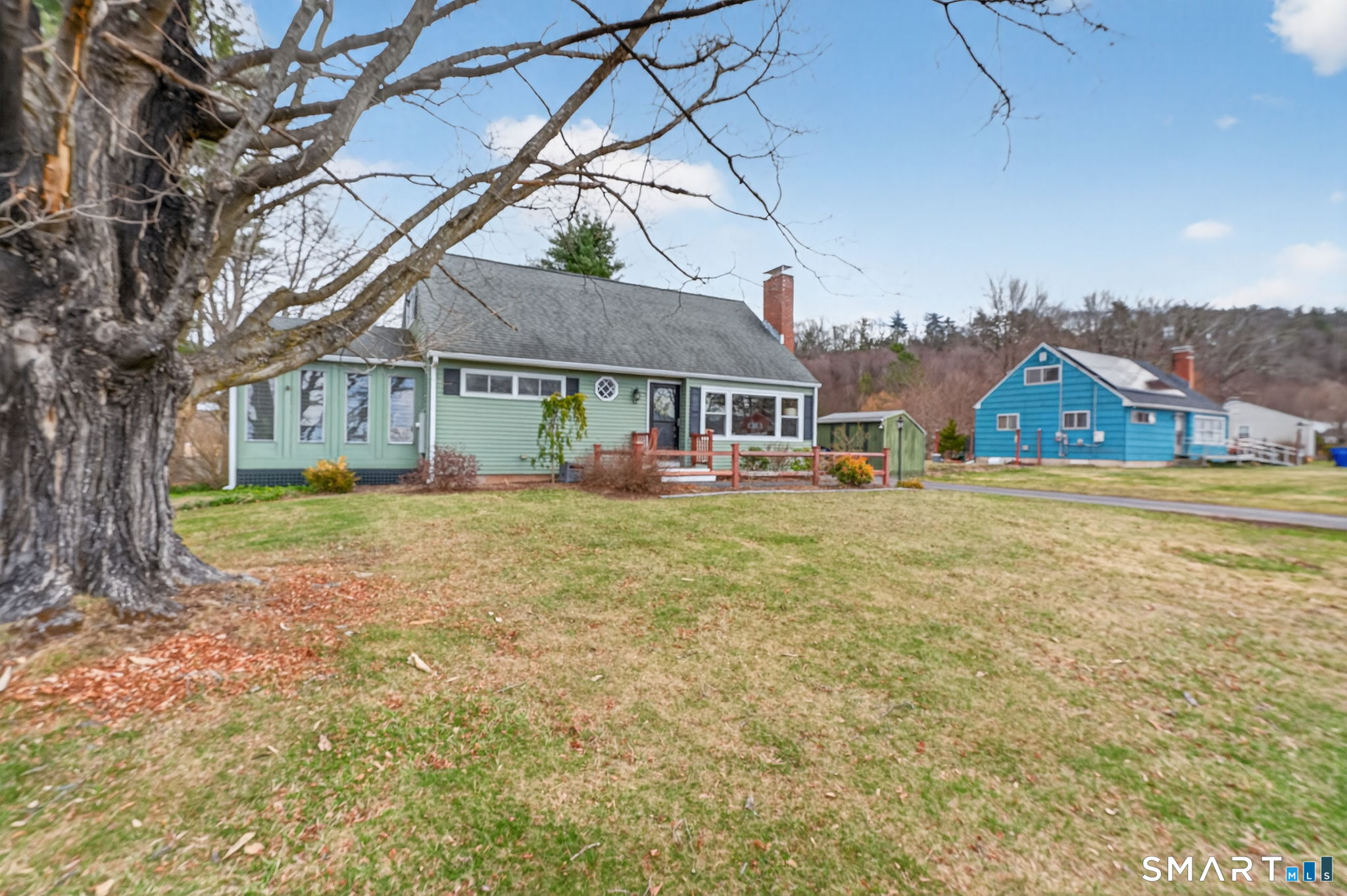 12 Lewis Street Simsbury, CT 06081 - Photo 34 of 35 a house view with a garden space
