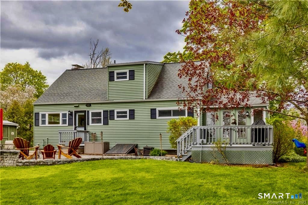 12 Lewis Street Simsbury, CT 06081 - Photo 4 of 35 a front view of house with yard and green space