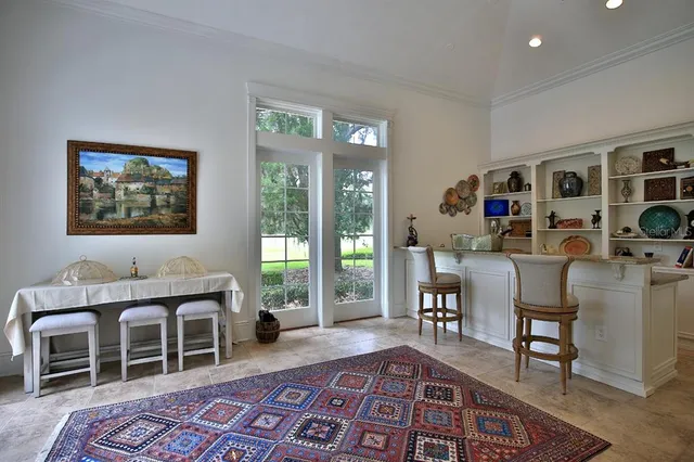 a view of a swimming pool with a yard