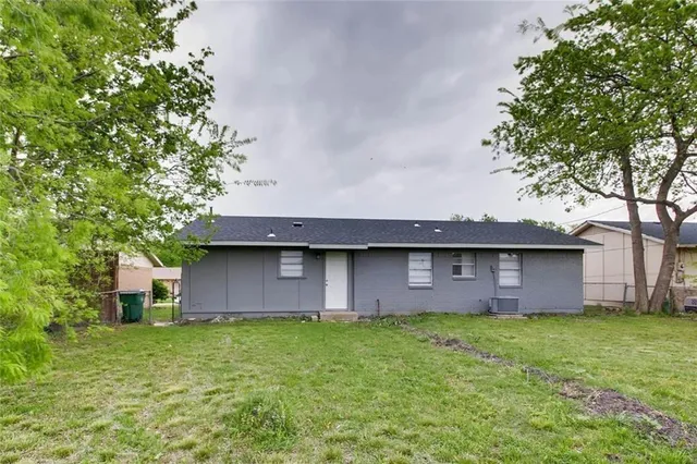 a front view of house with garden