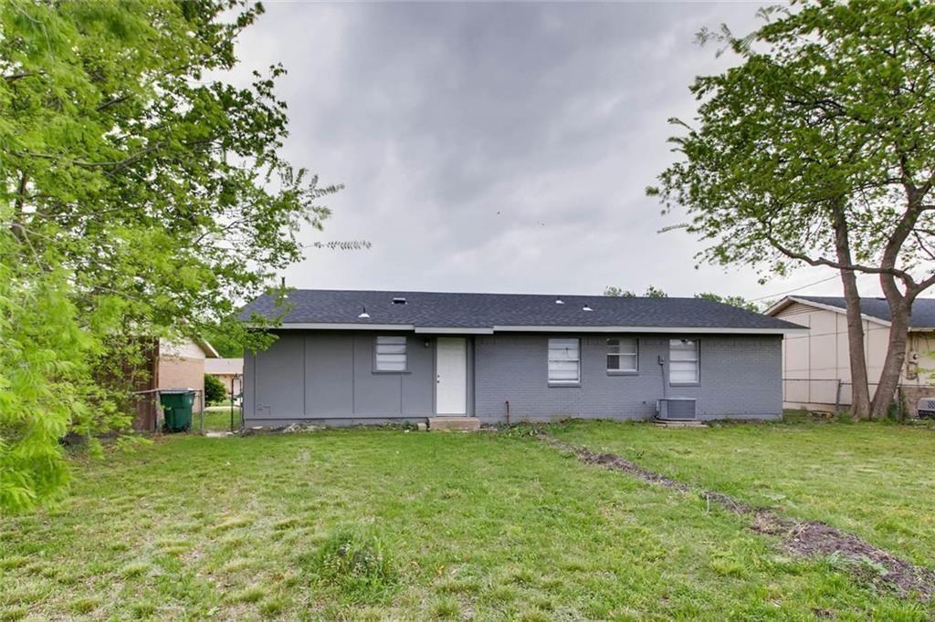 4903 Church Street Greenville, TX 75401 - Photo 9 of 10 a front view of house with garden