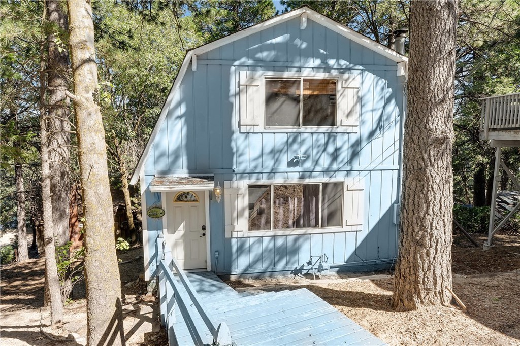 1144 Scenic Way Rimforest, CA 92378 - Photo 1 of 1 a front view of a house with a yard