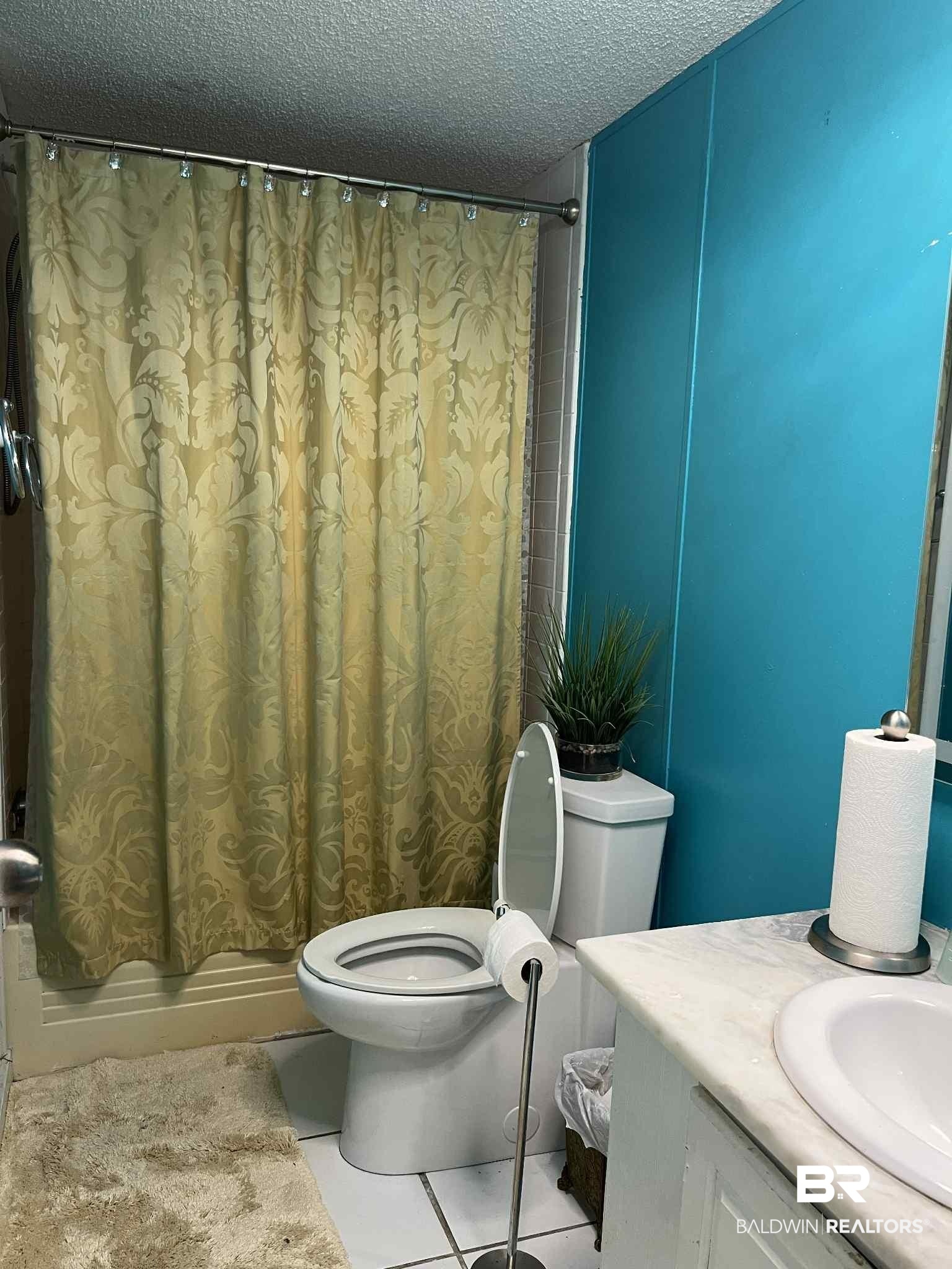 15418 Pine Grove Road Bay Minette, AL 36507 - Photo 11 of 18 Full bath featuring a textured ceiling, vanity, and tile patterned floors