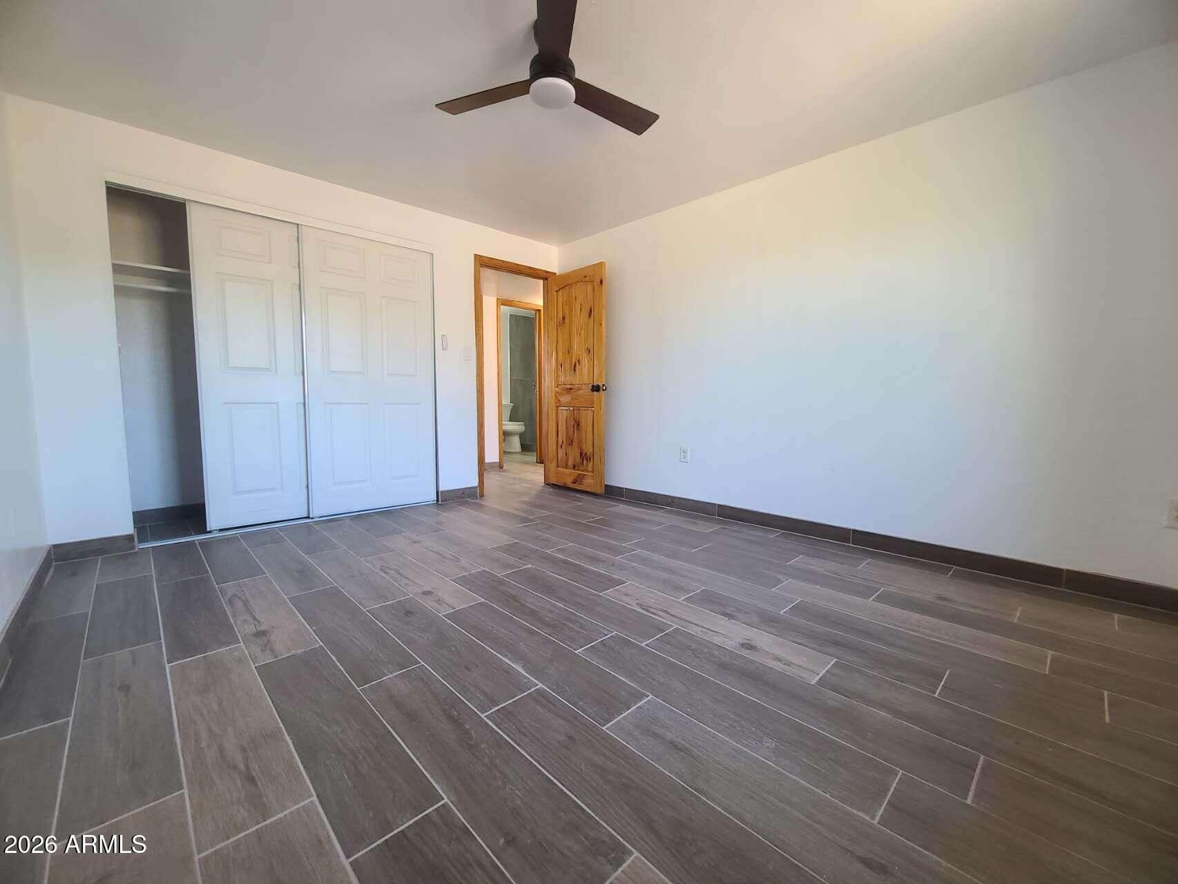 3702 East Thunderbird Road Phoenix, AZ 85032 - Photo 14 of 23 wooden floor in an empty room