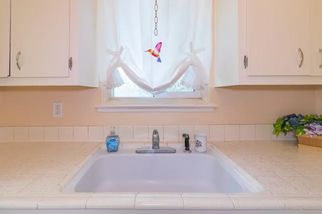 a bathroom with a bathtub and sink